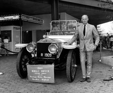 Lord Montagu with 1909 Rolls - Royce Silver Ghost at 1964 World's Fair, New York. Creator: Unknown