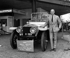 Lord Montagu with 1909 Rolls - Royce Silver Ghost at 1964 World's Fair, New York. Creator: Unknown