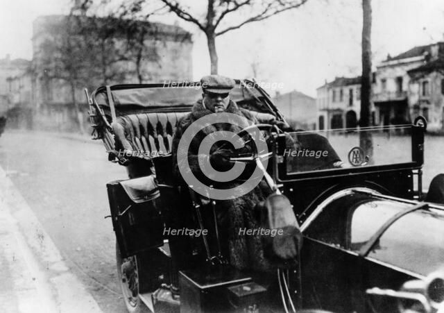 Lord Northcliffe at the wheel of a 1908 135 hp Mercedes, (c1908?). Artist: Unknown