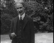 Lord Privy seal Andrew Bonar Law Standing in a Garden, 1921. Creator: British Pathe Ltd