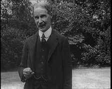 Lord Privy seal Andrew Bonar Law Standing in a Garden, 1921. Creator: British Pathe Ltd