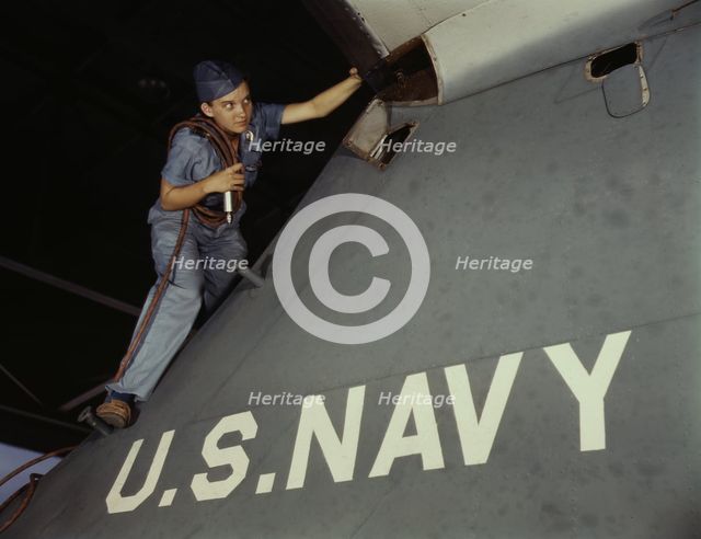 Lorena Craig is a cowler under civil service at the Naval Air Base, Corpus Christi, Texas, 1942. Creator: Howard Hollem.