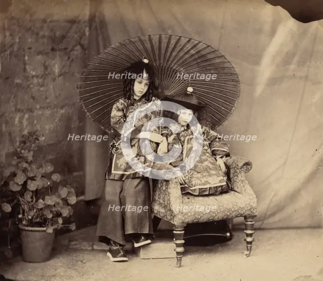 Lorina and Alice Liddell in Chinese Dress, 1860. Creator: Lewis Carroll.
