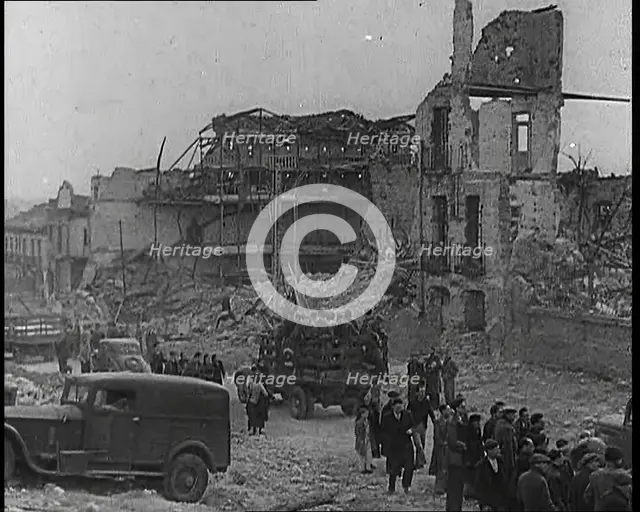 Lorries Carrying Spanish Nationalist Soldiers Loyal To Franco Through Madrid Past the..., 1939. Creator: British Pathe Ltd.