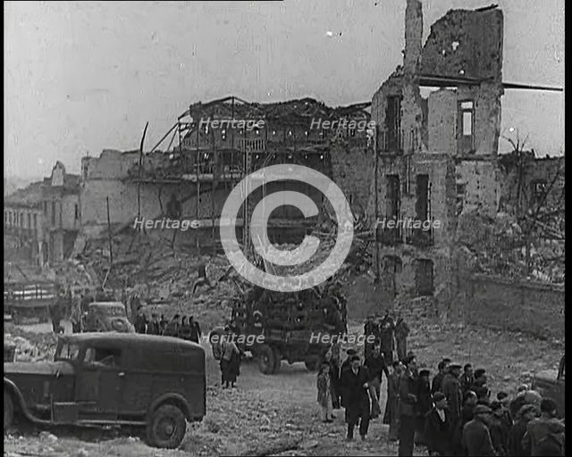 Lorries Carrying Spanish Nationalist Soldiers Loyal To Franco Through Madrid Past the..., 1939. Creator: British Pathe Ltd.