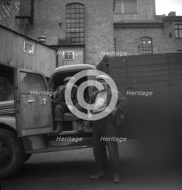 Lorry drivers at the sugar mill in Arlöv, Scania, Sweden, c1940s(?). Creator: Otto Ohm.