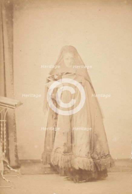 [La Comtesse in Hat with Veil and Cape with Fringe, Serie à la Ristori], 1860s. Creator: Pierre-Louis Pierson.