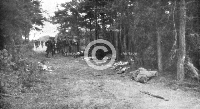 ''La Bataille de la Marne; Les chemins de la retraite ennemie semes d'equipements et de morts', 1914 Creator: Unknown.