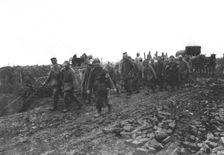 La Bataille de la Somme; a l'arriere de la bataille: prisonniers rapportant dans nos..., 1916. Creator: Unknown