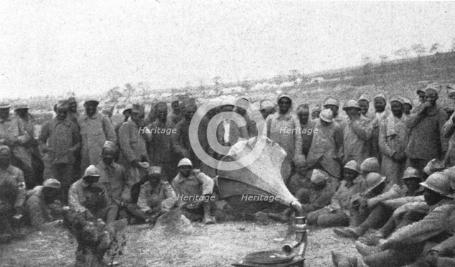'La Bataille de la Somme; La prise de la Maisonnette: les Senegalais autour d'un phonographe', 1916 Creator: Unknown.