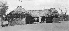 La grande guerre en Afrique; le drapeau francais flotte sur la case du lieutenant..., c1916. Creator: Unknown