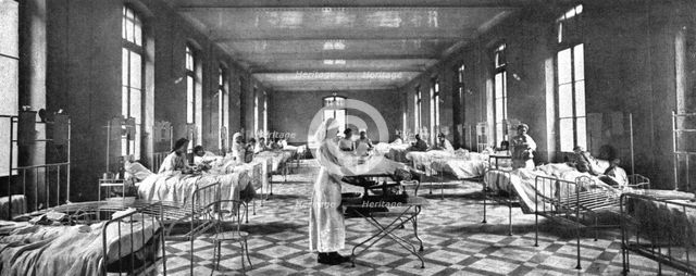 ' "La Guerre a L'Allemande"; Le lendamain de l'explosion,dans salle voisine et exactement..., 1918. Creator: Unknown.