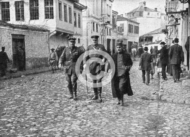 'La derniere etape de l'offensive; L'amiral anglais Troubridge visitant la ville reconquise', 1916. Creator: Unknown.