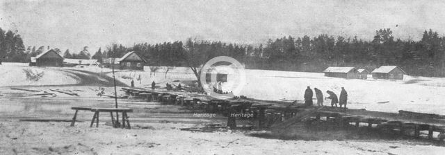 'La Diversion Russe de Bukovine, Petrograd, janvier 1916; Etablissement d'un pont le..., 1916. Creator: Unknown.