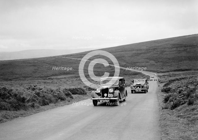 LA Forty's Riley Falcon ahead of J Boardman's Riley Kestrel at the MCC Torquay Rally, July 1937. Artist: Bill Brunell.