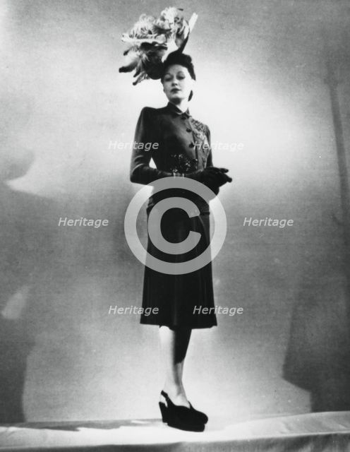 La femme chic, outfit by the French fashion designer Jacques Fath, Paris, January 1943. Artist: Unknown