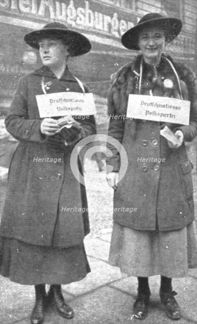 'La Nouvelle Europe; les elections Allemandes; deux jeunes distributrices de bulletins..., 1919. Creator: Unknown.