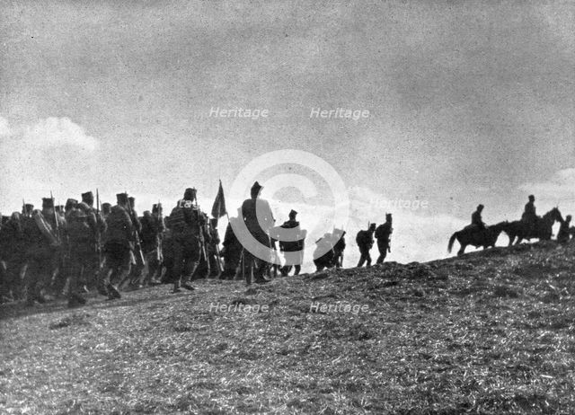 ''La Serbie Courageuse; Traversant le col de Goutchevo, l'armee serbe monte a l'offensive', 1914 Creator: Unknown.