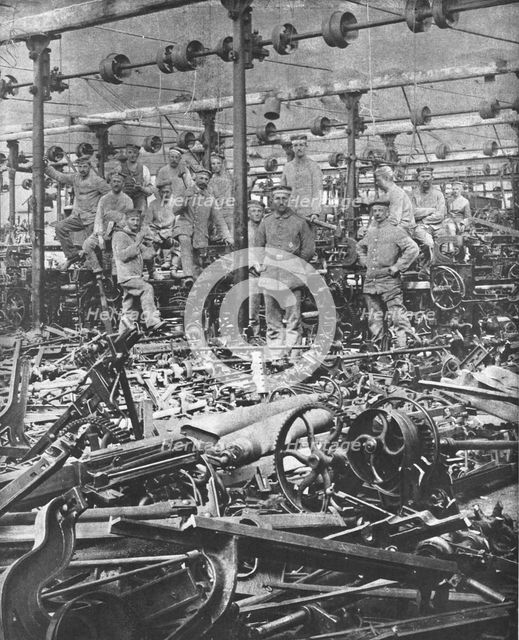 'La Suppression de L'Industrie Francaise; la destruction au Marteau des metiers du tissage..., 1917. Creator: Unknown.