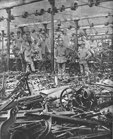 La Suppression de L'Industrie Francaise; la destruction au Marteau des metiers du tissage..., 1917. Creator: Unknown