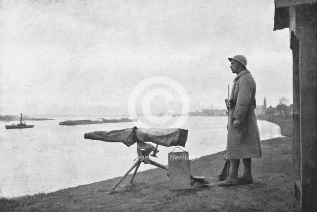'La Paix Victorieuse; La Garde au Rhin: Janvier 1919, mitrailleur du 28e d'infanterie..., 1919. Creator: Unknown.