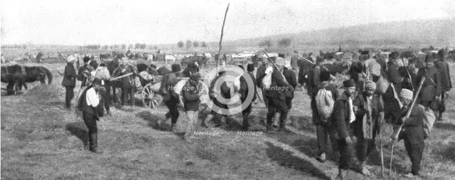 'La Roumanie Envahie; Paysans de la Dobroudja emigrant vers le Nord', 1916. Creator: Unknown.