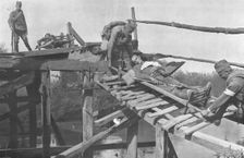 La Retraite Serbie; Evacuation des blesses sur la rive droite de la Morava, par un pont de..., 1916 Creator: Vladimir Betzitch
