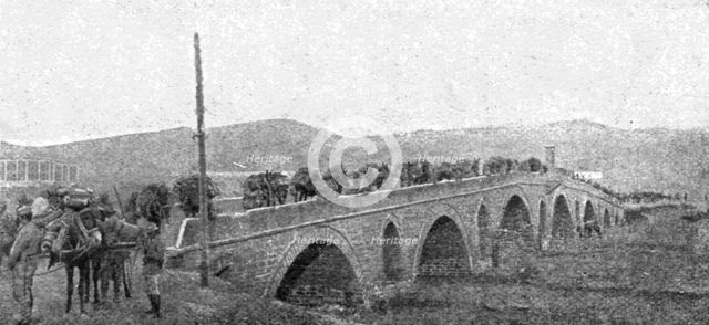 ''La rupture des lignes Bulgares; La traversee du grand pont de pierre sur la Bregalnitza..., 1918. Creator: Unknown.