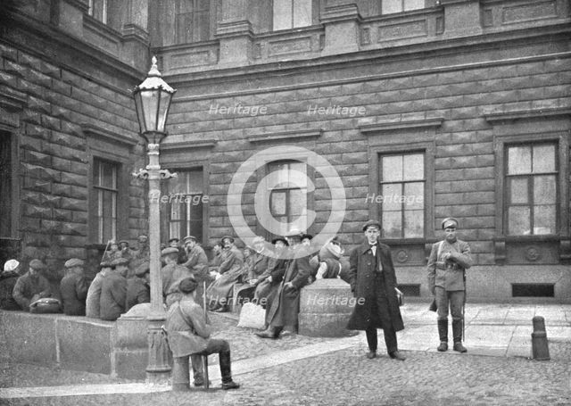 ''La terreur Rouge; La "Bourgeoisie" traquee; groupe d'otages arretes par les Rouges devant..., 1918 Creator: Robert Vaucher.