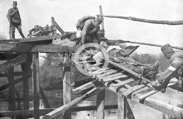 'La tragique retraite Serbe; Le transport des blesses sur la rive droite de la..., 1915 (1924). Creator: Vladimir Betzitch.