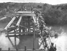 La tragique retraite Serbe; Un pont sur la Koloubara qui a ete pris, repris, detruit..., 1915 (1924 Creator: Vladimir Betzitch