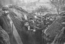 La vie en Campagne; On la mange souvent debout et a la hate, le fusil a portee de la main 1914. Creator: Unknown