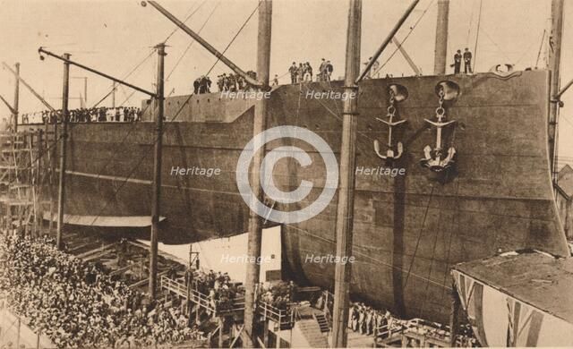 Launch of the battleship HMS `Queen Elizabeth`, 16 October 1913 (1935).  Artist: Unknown.