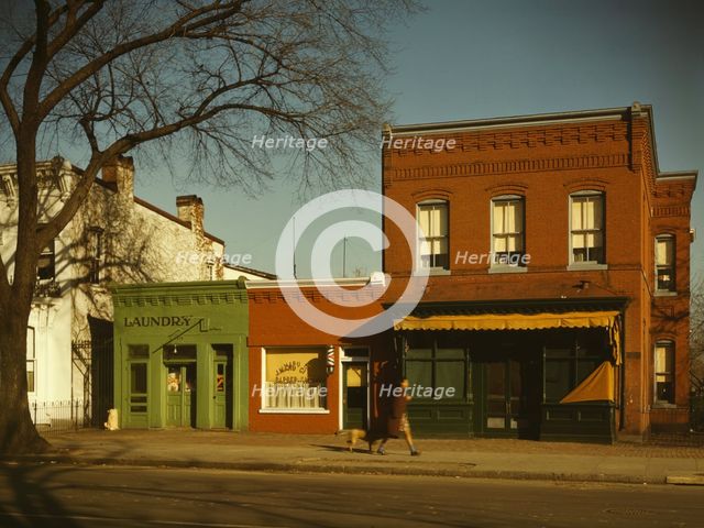 Laundry, barbershop and stores, Washington, D.C.?, between 1941 and 1942. Creator: Louise Rosskam.