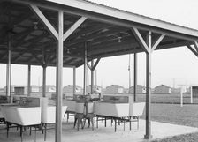 Laundry facilities at Westley camp for migratory labor, San Joaquin Valley, California, 1938. Creator: Dorothea Lange