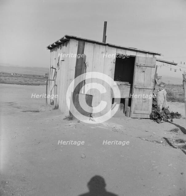 Laundry facilities for ten cabins at Arkansawyers auto camp, Salinas Valley, CA , 1939. Creator: Dorothea Lange.