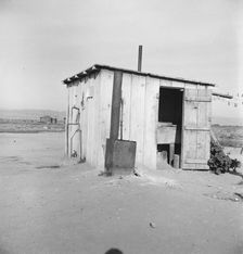 Laundry facilities for ten cabins at Arkansawyers auto camp, Salinas Valley, California, 1939. Creator: Dorothea Lange