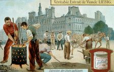Laying an asphalt-based surface in a Paris street, c1900. Creator: Unknown