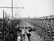 Laying keel of no. 400, Globe Iron Works, Cleveland, Ohio, ca 1900. Creator: Unknown