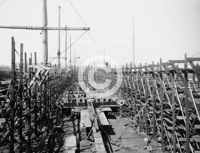Laying keel of no. 400, Globe Iron Works, Cleveland, Ohio, ca 1900. Creator: Unknown.