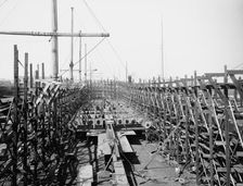 Laying keel of no. 400, Globe Iron Works, Cleveland, Ohio, ca 1900. Creator: Unknown