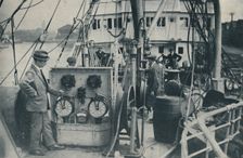 Laying the Lines That Bridge The Seven Seas c1935. Creator: Siemens Brothers and Company Limited