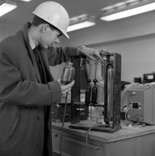 Lab testing at the Park Gate Iron & Steel Co, Rotherham, South Yorkshire, 1964. Creator: Michael Walters