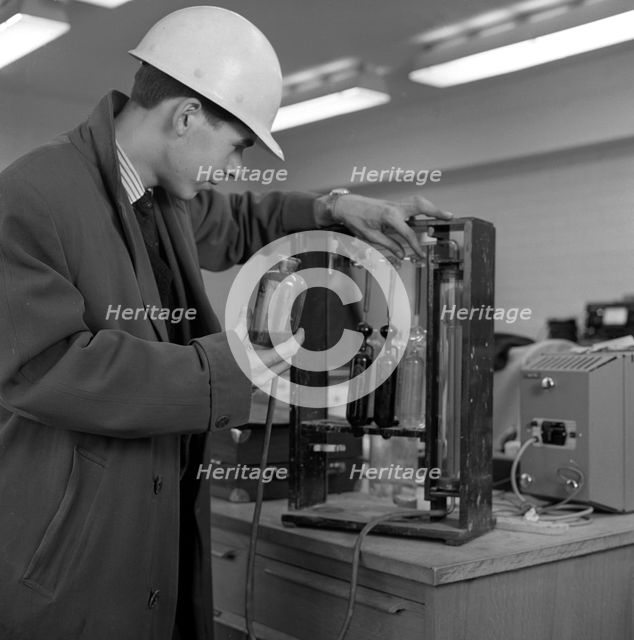 Lab testing at the Park Gate Iron & Steel Co, Rotherham, South Yorkshire, 1964. Creator: Michael Walters.