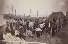 Laborers at Quartermaster's Wharf, Alexandria, Virginia, 1863-65. Creator: Attributed to Andrew Joseph Russell