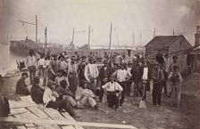 Laborers at Quartermaster's Wharf, Alexandria, Virginia, 1863-65. Creator: Attributed to Andrew Joseph Russell