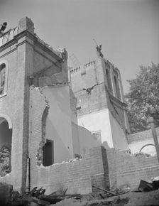 Laborers wrecking buildings on Independence Avenue, Washington, D.C, 1942. Creator: Gordon Parks