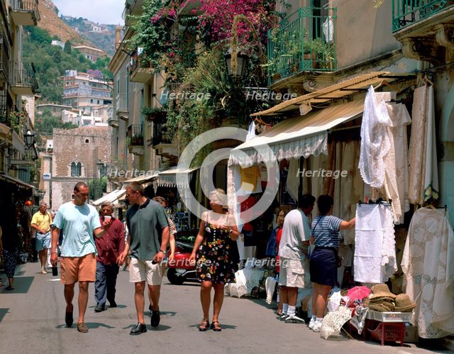 Lace shops, Via Teatro Greco, Taormina, Sicily, Italy. Creator: Peter Thompson.