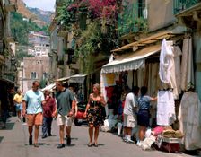 Lace shops, Via Teatro Greco, Taormina, Sicily, Italy. Creator: Peter Thompson