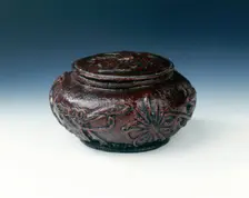 Lacquered and moulded mandarin orange skin box, Qing dynasty, China, 19th century. Creator: Unknown